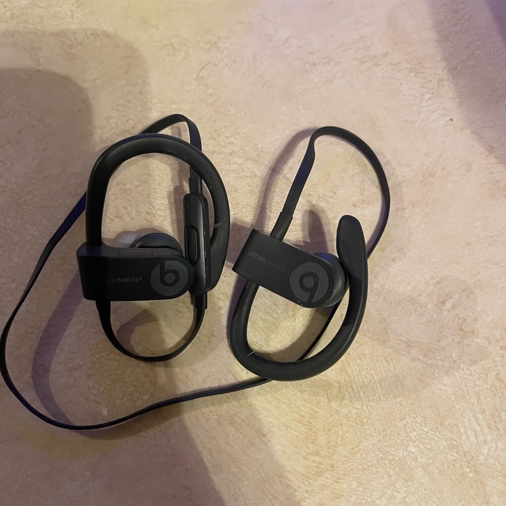 Beats head phones. Charger included.